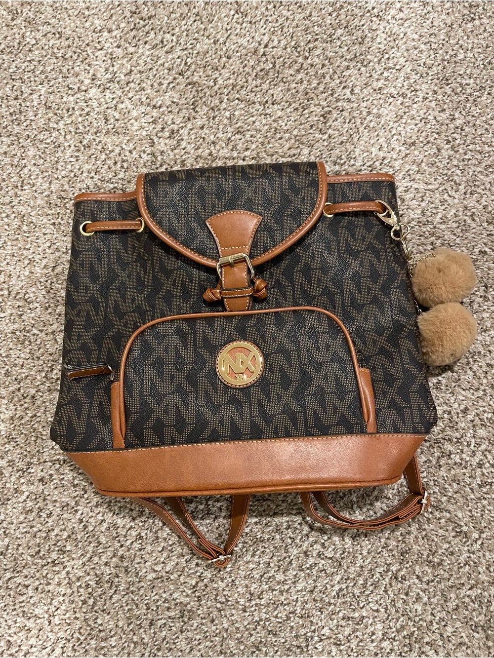 NX Backpack with Pom Pom Charm